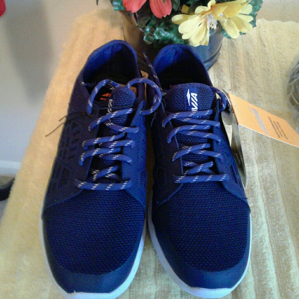 Sale Sale! New Beautiful Blue Athletic Shoes with white bottoms.